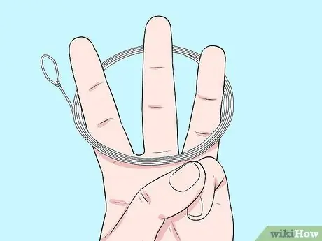 Привяжите леску к лидеру Шаг 6