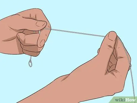 Привяжите леску к поводку Шаг 8