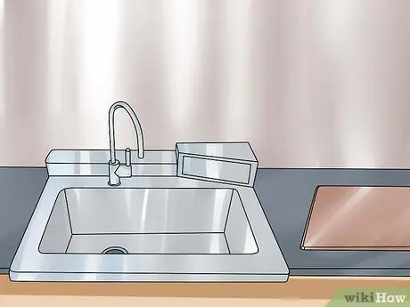 Выпотрошить форель Шаг 2