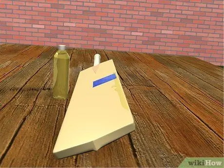 Смажьте и сломайте новую биту для крикета, шаг 2