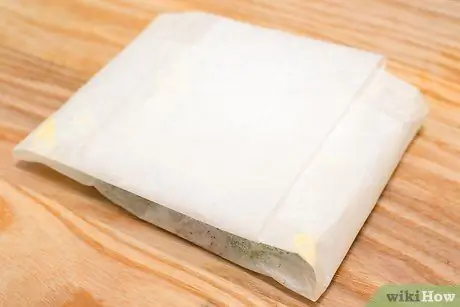 Сложите и запекайте рыбу в пергаментной бумаге Шаг 13