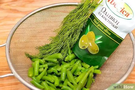 Сложите и запекайте рыбу в пергаментной бумаге Шаг 4