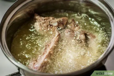 Приготовить жареные ребрышки Шаг 6