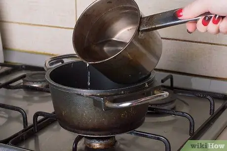 Приготовьте золотой сироп, шаг 4