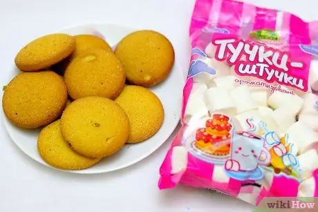 Приготовить расплавленное печенье снеговиков Шаг 4