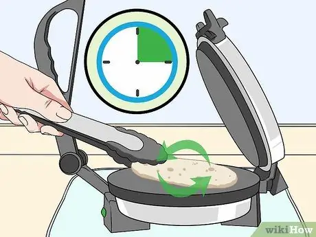 Сделайте Roti с помощью электронного Roti Maker Step 13