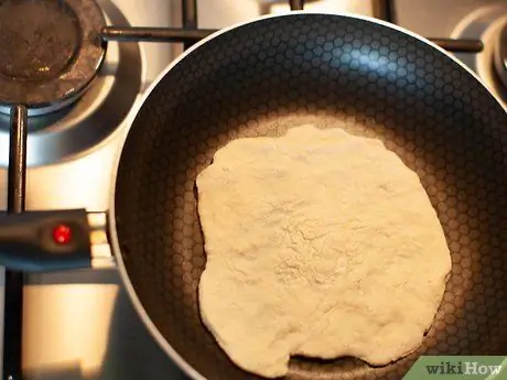 Сделайте Jowar Roti Step 10