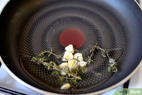 Сделайте Ackee and Saltfish Шаг 6