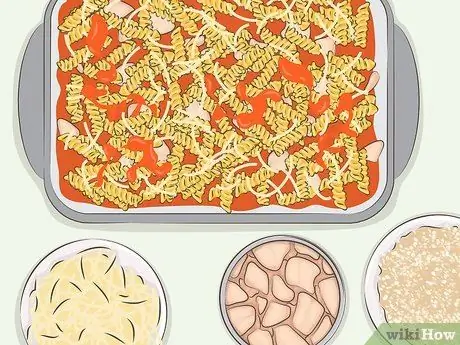 Приготовить консервированную курицу Шаг 6