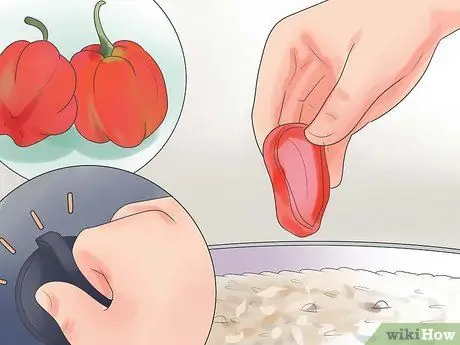 Приготовьте Джона Джона (гаитянский черный рис) Шаг 11