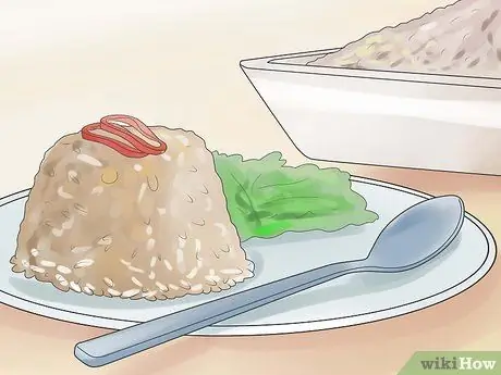 Приготовьте Джона Джона (гаитянский черный рис) Шаг 12