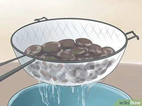 Сделайте Джона Джона (гаитянский черный рис) Шаг 2