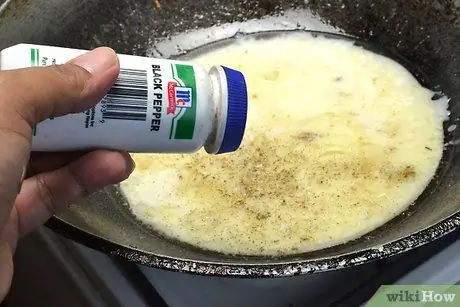 Приготовьте Гинатаанг Тилапия Шаг 6