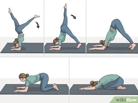 Выполняйте стойку на предплечьях, шаг 5