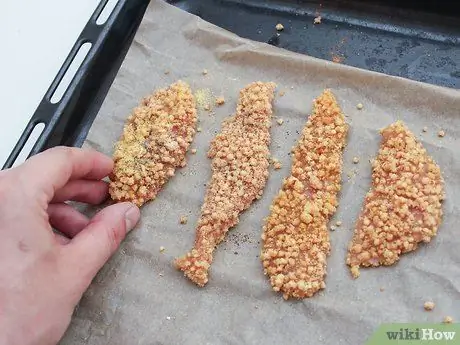 Приготовить куриные пальцы, покрытые киноа, шаг 7 Приготовить куриные пальцы, покрытые киноа, шаг 7
