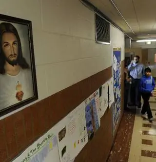 Но почему он ходит в церковную школу?