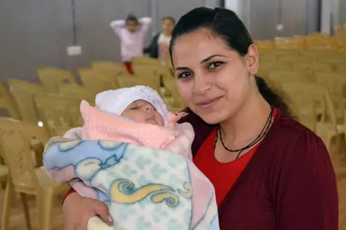 Зейн, младенец, чудом переживший войну