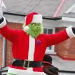 ухмыляться